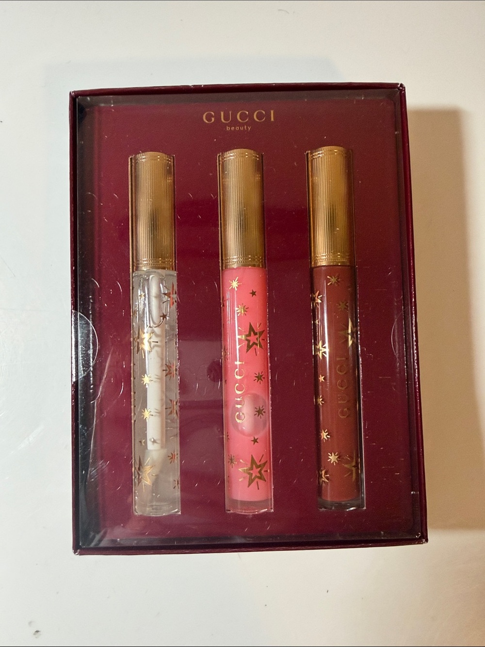 Gucci Lip Gloss Trio — Clear, Pink, Brown with Gold Accents